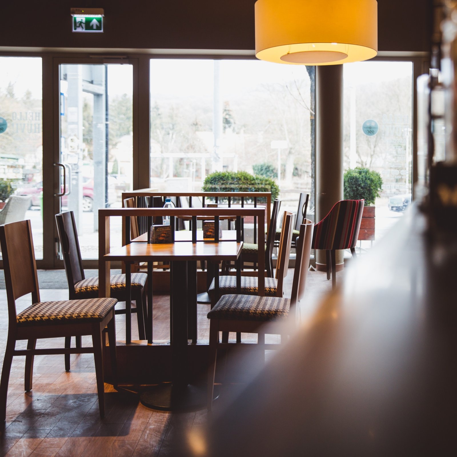 modern-cafe-interior-in-wooden-style-in-sunlight.jpg